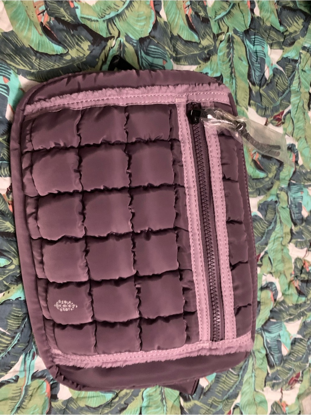 Free People Movement
Quilted Muff Sling Bag